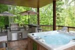 Outdoor Kitchen Grill with Burners and Hot Tub on the Porch